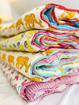 block print mini quilts in animal prints. Kids bedding from Bombaby