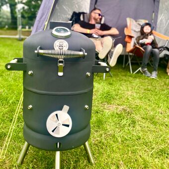 A BeardSmoke Mini-Un barbecue smoker being enjoyed whilst camping