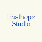 Easthope Studio Logo - Bright blue text on cream background 