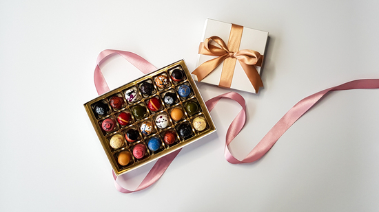 Humblebeez box of artisan chocolate bonbons with coloured ribbon
