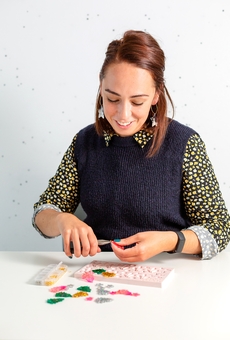 The Joyful Rebel making up some earrings.