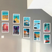 Gallery wall featuring travel poster collection