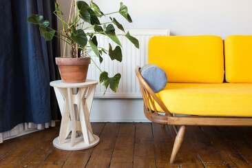 Plywood Plant table and yellow Ercol Studio Daybed