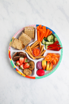 Biggie Pick Plate filled with sandwiches, fruit, veg and snacks