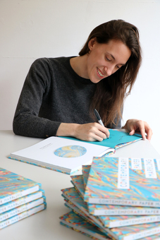 Lucy signing copies of her book 'Contemporary Paper Marbling'