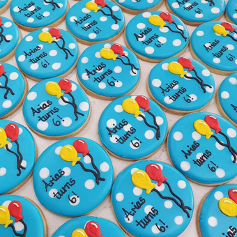 Colourful personalised polka dot birthday biscuits