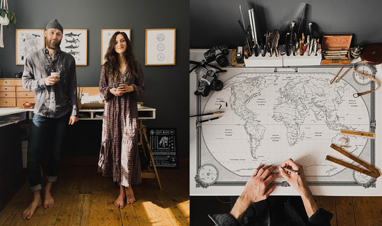 artists in the studio and designing world map