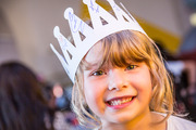 Child visiting Think2Speak wearing a handmade paper crown