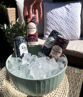 Canned Margarita and Tequila & Tonic chilled in a bucket of ice, ready to enjoy.