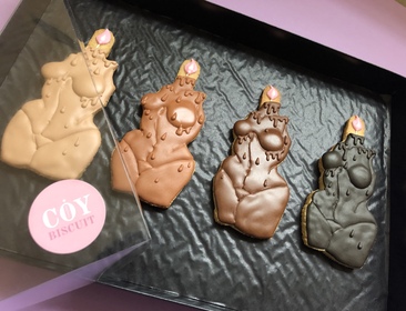 Varying shades of nude body shaped candle biscuits