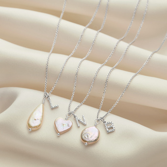 Diamond letter pendants with freshwater pearl necklaces
