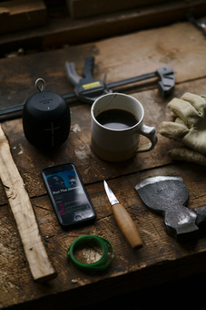 The essentials for my workshop: coffee, music, knives, hatchets, and personal protective equipment!