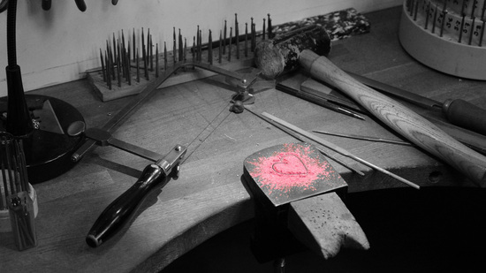 Pink heart on a work bench