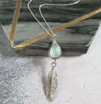 Pale blue chalcedony stone set silver feather necklace