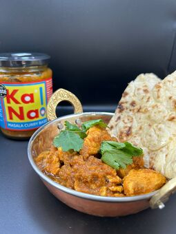 Ka Na Chicken Curry and Naan with a jar of award winning great taste award curry base