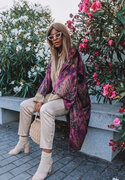 Purple leopard kimono paired with white trousers 