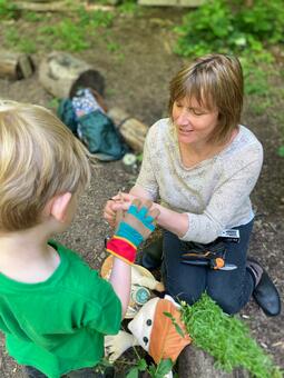 Outdoors at Forest School using nature to inspire creativity and a love of learning