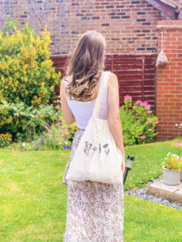 Shannon wearing her best selling 'Floral Tote Bag' in the garden in summer
