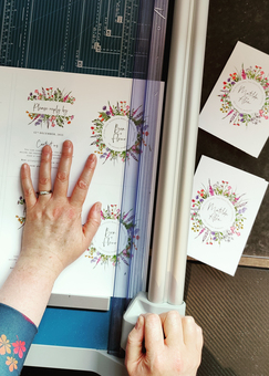 Hand cutting wedding invitations
