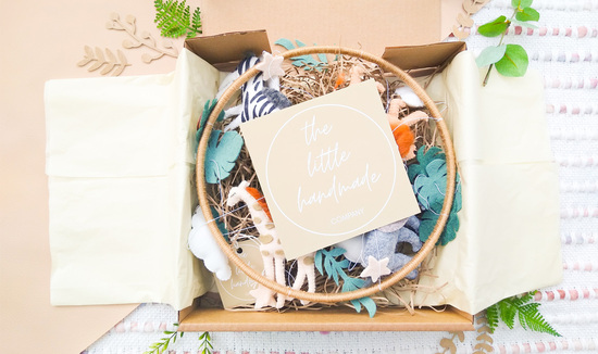The Little Handmade Company Packaging, Safari Mobile wrapped in tissue and boxed