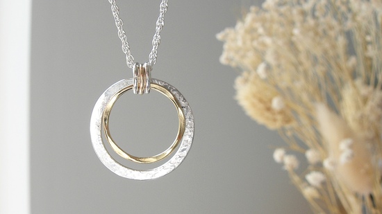 Silver and yellow filled gold circles pendant  by Hazey Designs