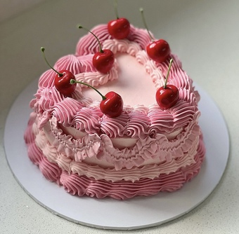 Our best selling fake cake topped with cherries 