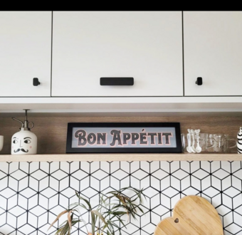 Bon Appetit French Framed Print in kitchen