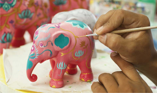 Elephant Parade Statue being handpainted