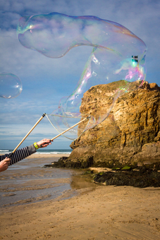 The Large Bubble Wand Set being used to create astonishingly Really Big Bubbles on Perranporth beach.