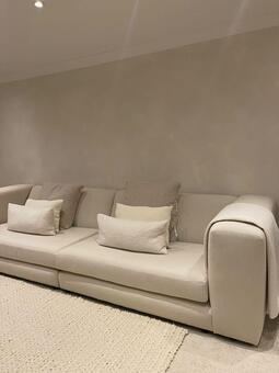 Boucle cushions and Boucle throw displayed on a stunning Boucle sofa