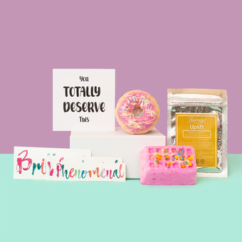 Pick Me Up Gift Set, showing cheerful bath and skincare products, along with a set of positivity stickers