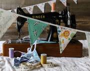 mini bunting with old fashioned sewing machine