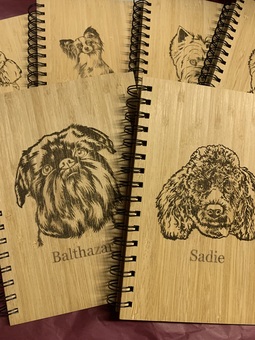 Notebooks engraved with different Dog designs including Poodle, Griffon Brussells, Papillon and Westie