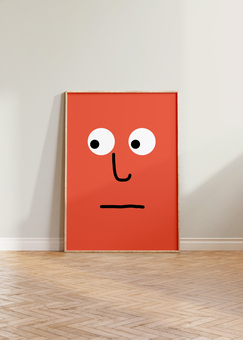 framed art print featuring orange cartoon face print