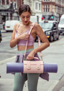 Fashionable yoga mat carrier made in high quality vegan leather