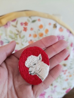 embroideredf alpaca brooch