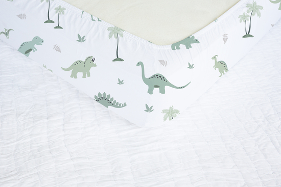 Green dinosaur fitted cot sheet. 