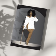 Black woman with big afro hair wearing a white oversized shirt, holding a gold cane.