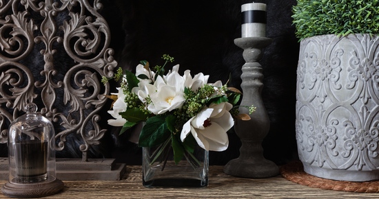 Vase with faux flowers and garden pot