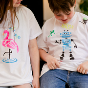 Children with their hand printed t-shirts