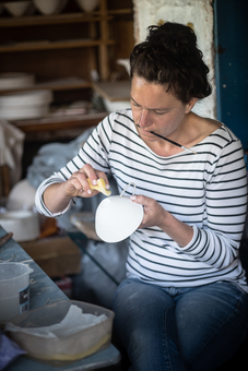 Becky Mackenzie working in her ceramics studio