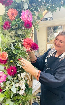 Rebecca creating a large floral display