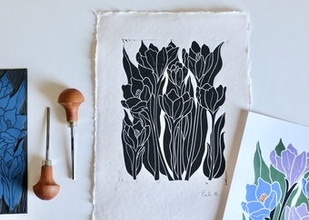 All designs start as a hand carved linocut design