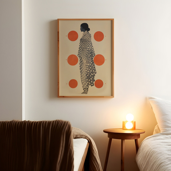 Art print of a woman's silhouette on a warm neutral backdrop, accented with vibrant red circles.