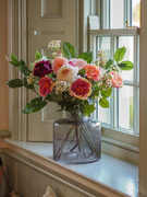 Fake flower arrangement with artificial roses 