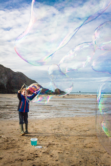Really Big Bubbles being made on the Cornish coast using the Really Big Bubbles Standard Wand and Bubble Mixture.