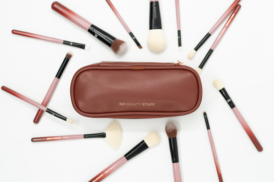 So Beauty Stuff brush bag surrounded by makeup brushes