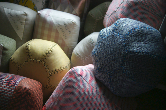 A collection of individually made pouffes and footstools