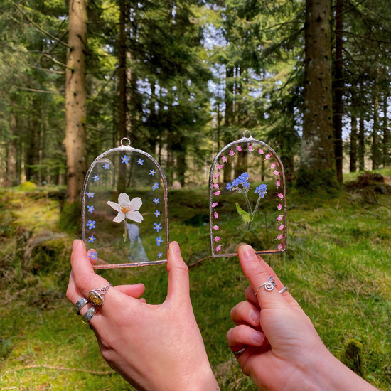 Two glass Arches with pressed flowers