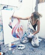 In my overalls at my studio painting a flamingo as part of my animal series